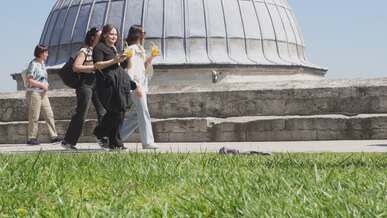 people enjoying rooftop stroll in istanbul