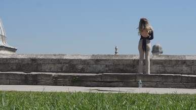 casual outdoor gathering by ancient walls