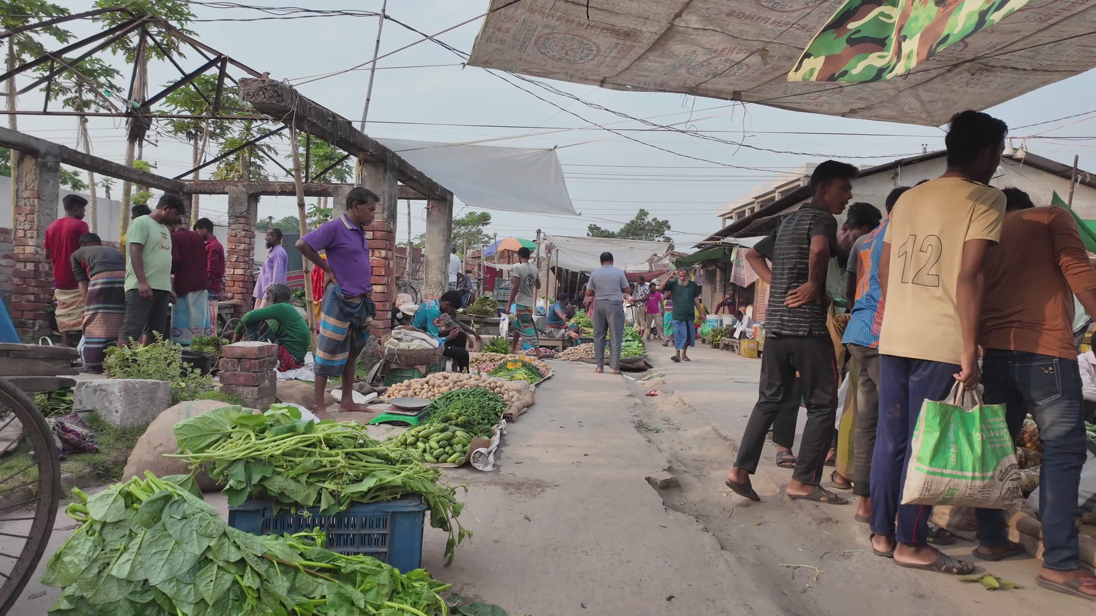 Bustling Local Market with Fresh Produce and Shoppers Free Stock Video ...