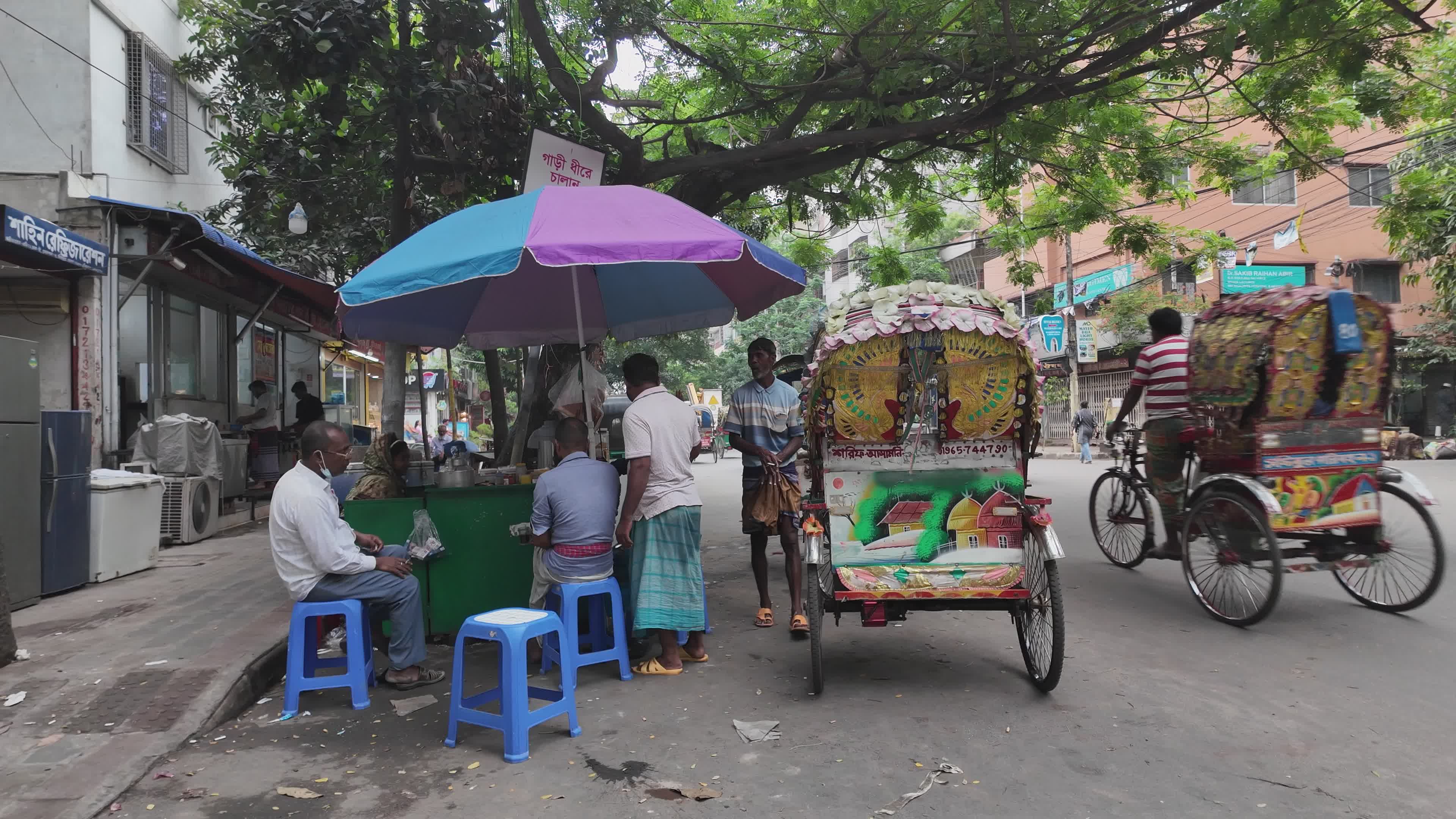 Street Food Stand with Colorful Rickshaws Free Stock Video Footage ...