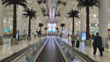 dubai airport terminal interior with passengers