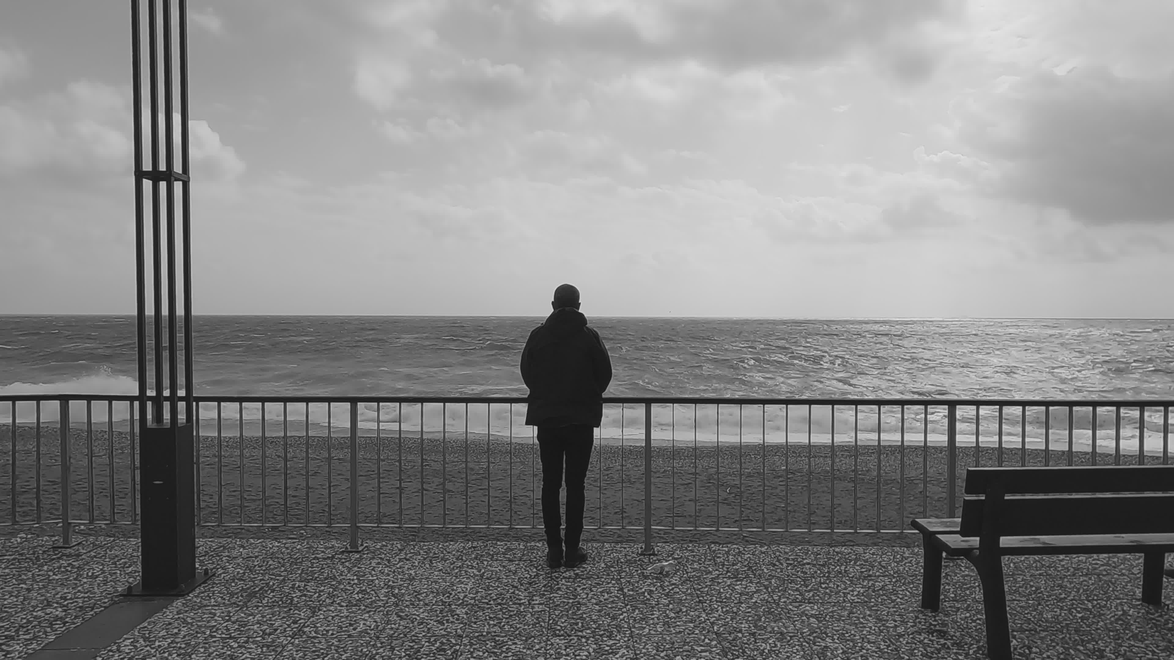 Solitary Contemplation at Seaside in Monochrome Free Stock Video ...