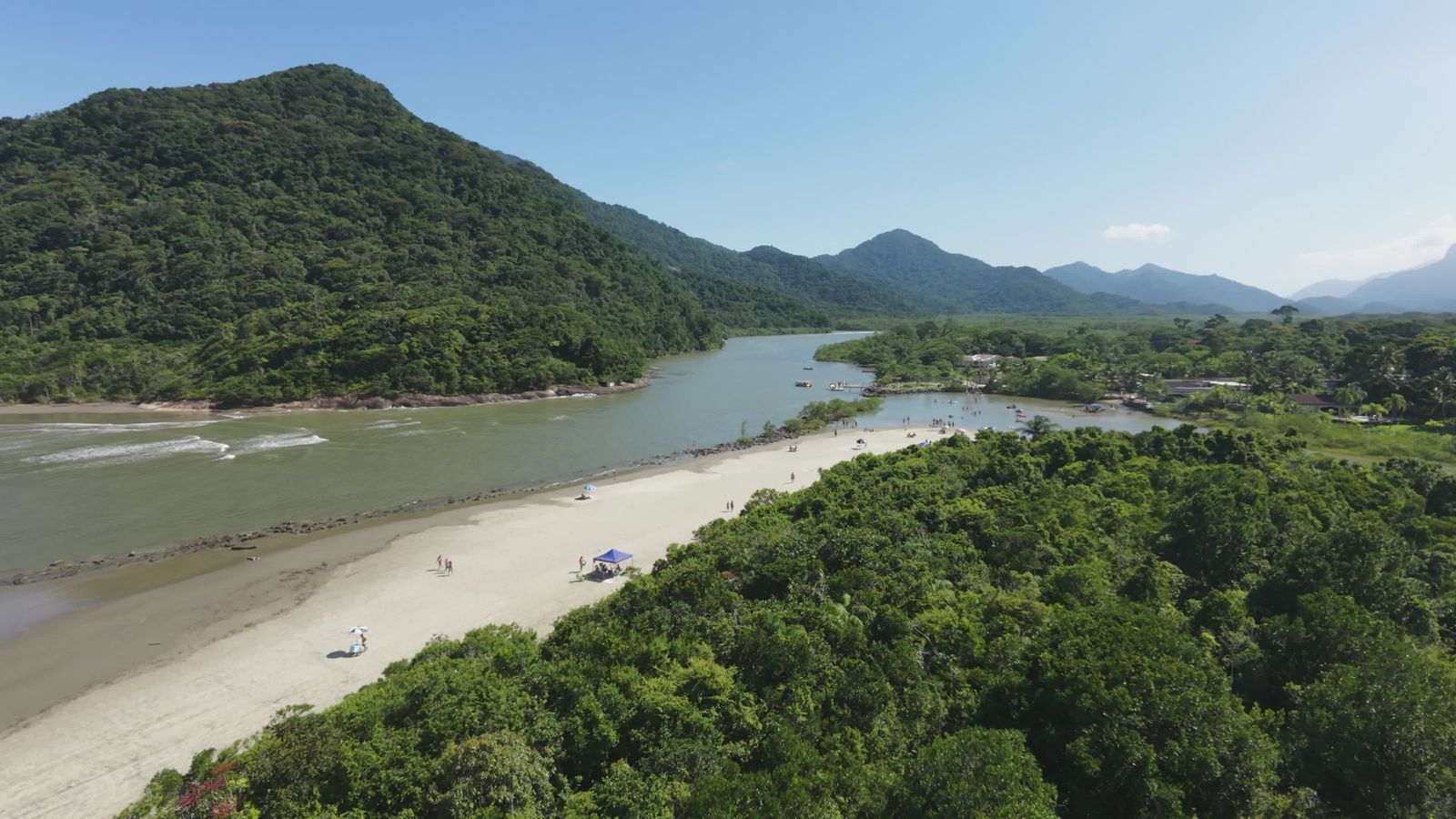 Drone Footage of a River Flowing by Green Mountains Free Stock Video ...