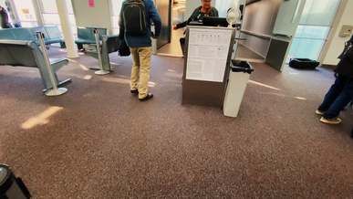 going through the process of boarding an airplane flight