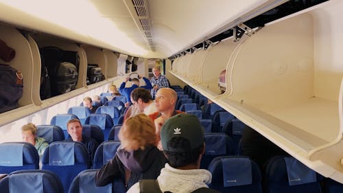 Passengers Entering The Airplane