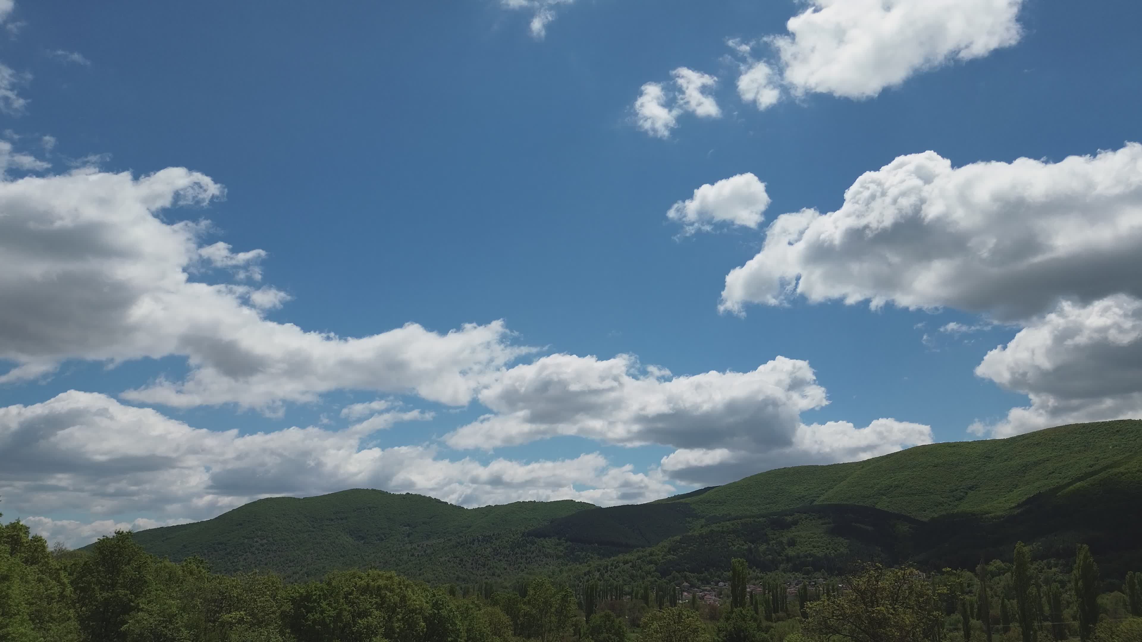 Scenic Mountain Landscape Under Blue Skies Free Stock Video Footage ...