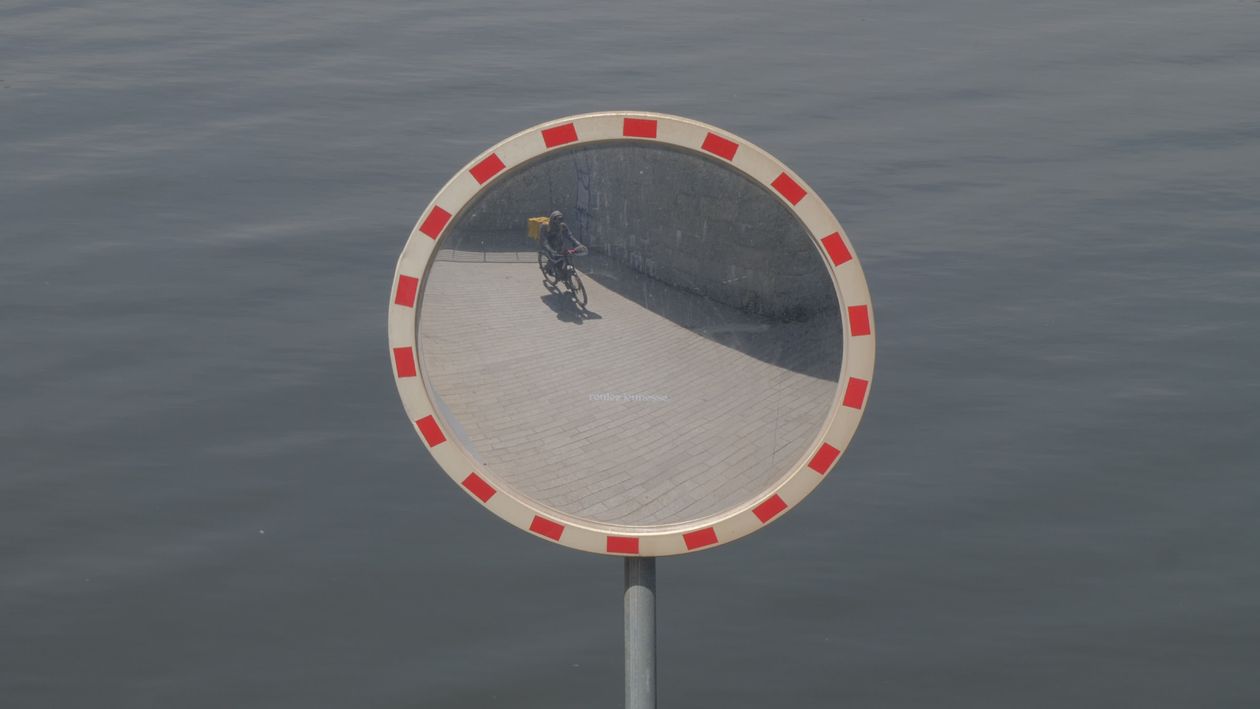 Reflection of Cyclist in Traffic Mirror Free Stock Video Footage ...