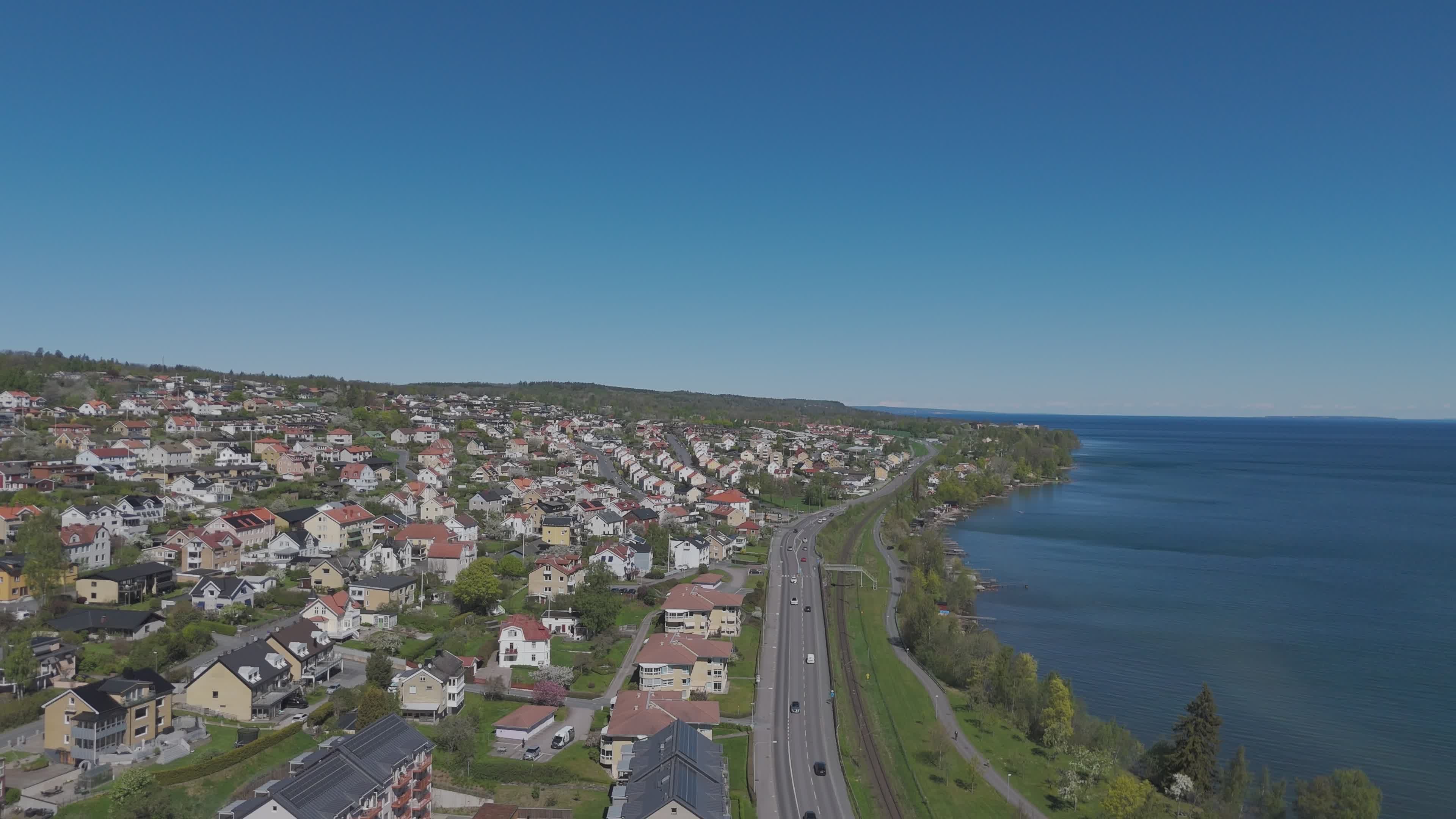 Scenic Aerial View of Coastal Town and Highway Free Stock Video Footage ...