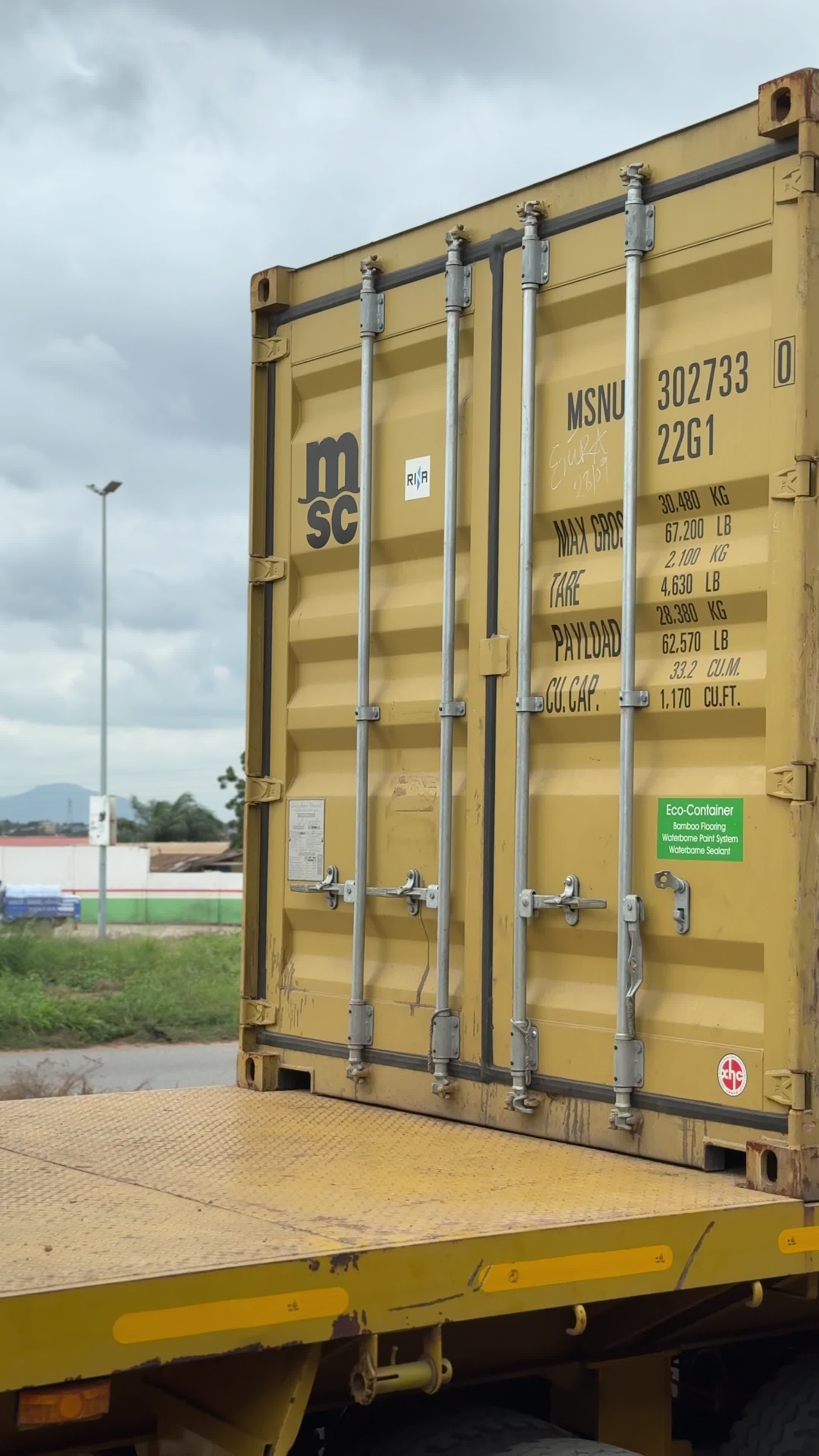 Yellow Shipping Container on a Truck in Transit Free Stock Video ...