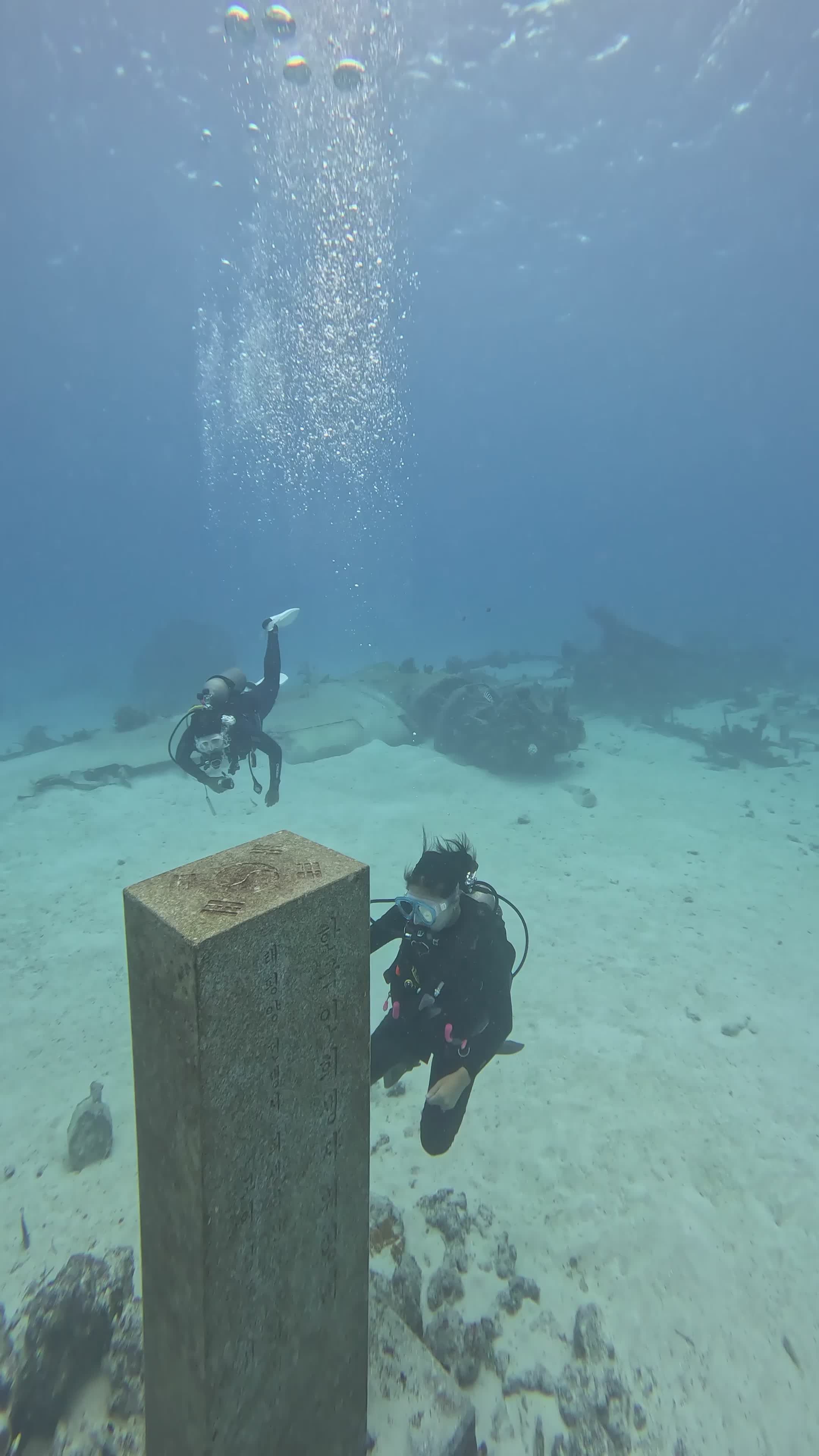 Underwater Divers Exploring Stone Monument Free Stock Video Footage ...