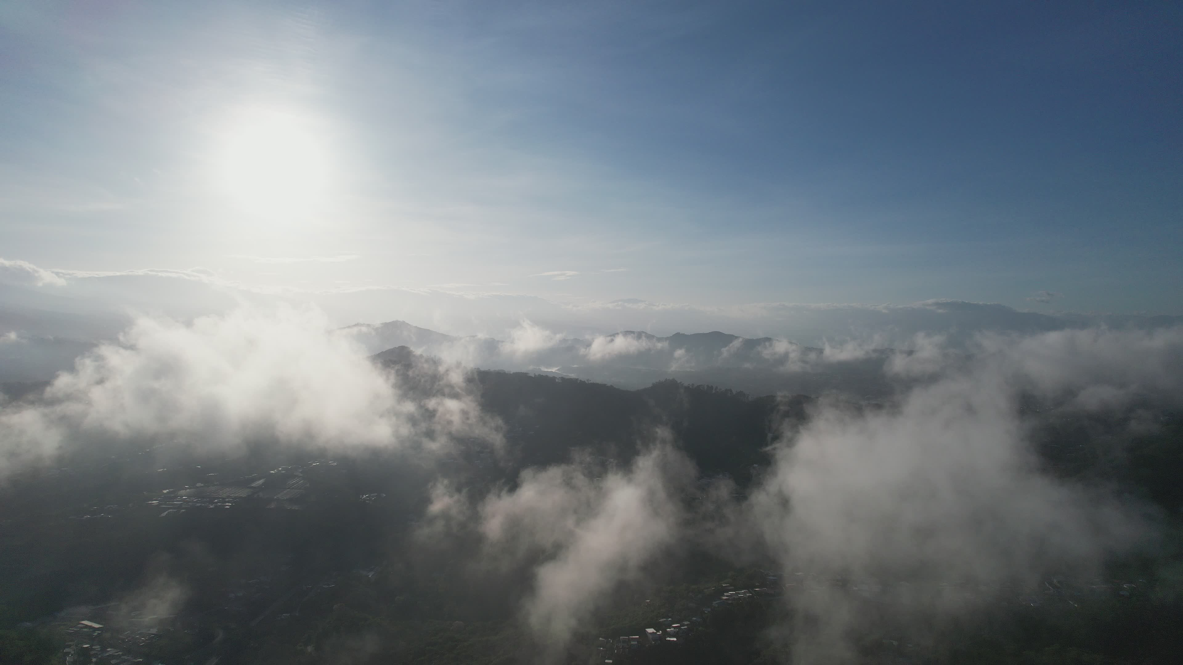 Aerial View of Clouds Over Mountain Range at Sunrise Free Stock Video ...