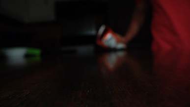 spreading junk food over the surface of a wooden table