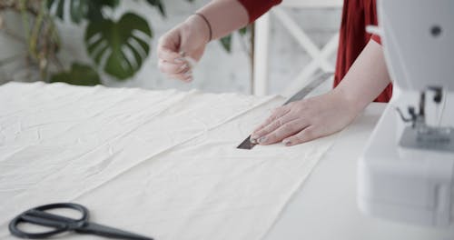Measuring A Fabric Cloth For The Cutting Size