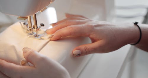 Woman Hand on Sewer Stitch White Cloth u, Stock Video