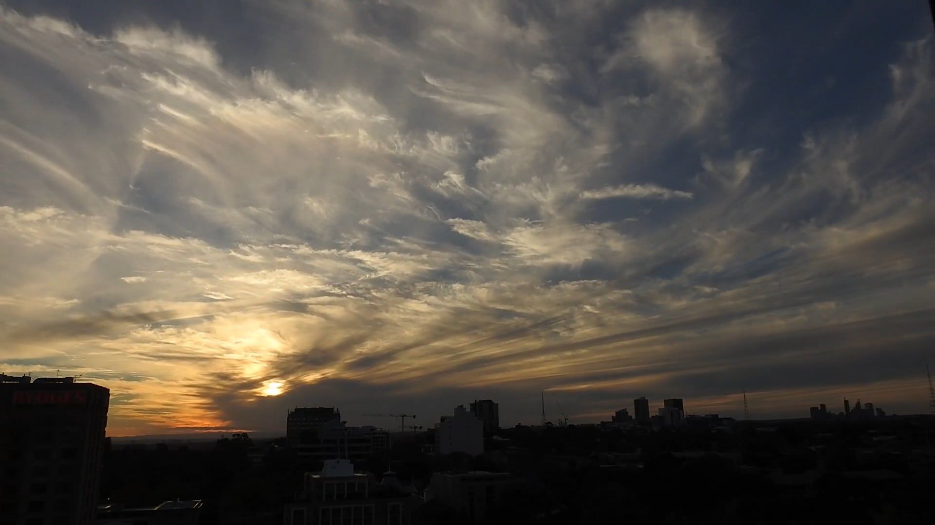 Time Lapse Video Of Moving Clouds Above The City · Free Stock Video