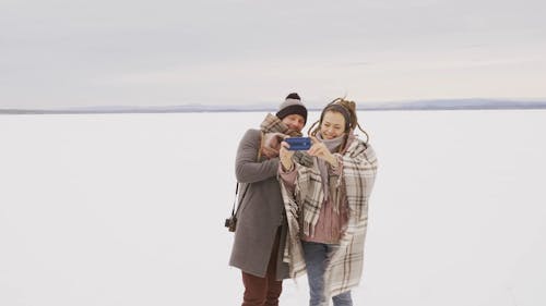 Happy Couple Taking A Picture Together