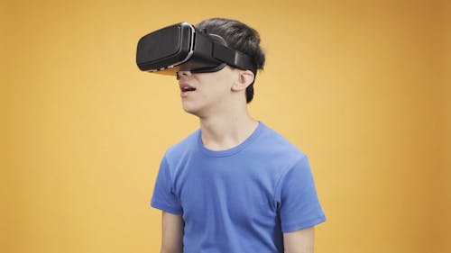  Boy Using A Virtual Reality Headset 