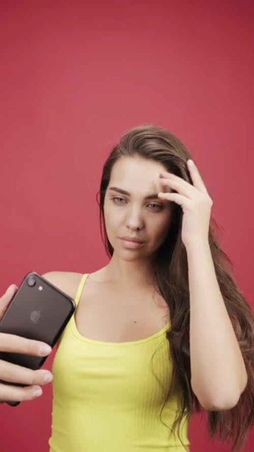 Footage Of A Woman Taking Picture Of Her Self