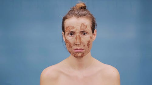 Woman with Dry Mud Mask