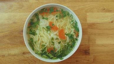 fresh chicken noodle soup with vegetables