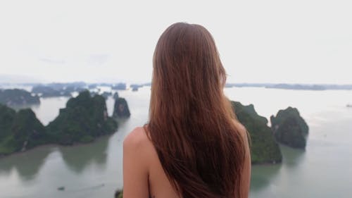 Footage Of A Woman Checking The Islands View