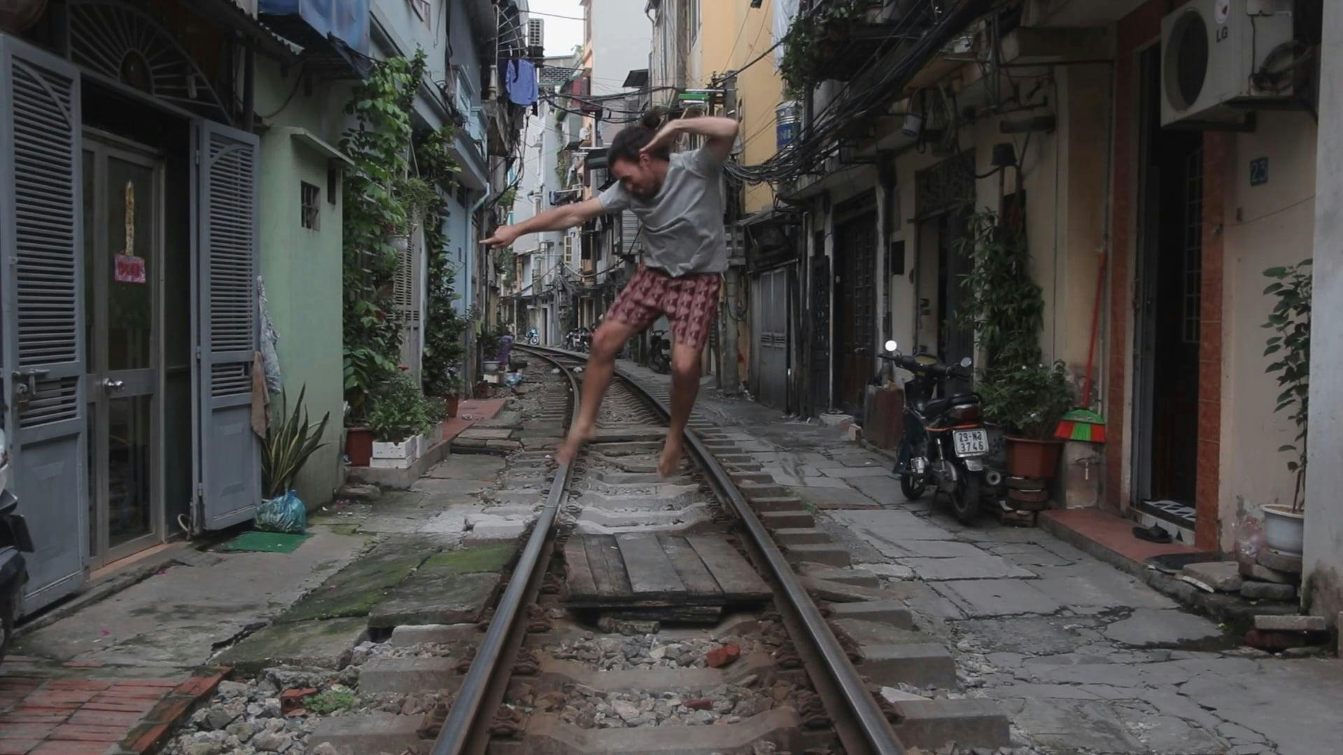 Man Jumping In The Train Trails · Free Stock Video