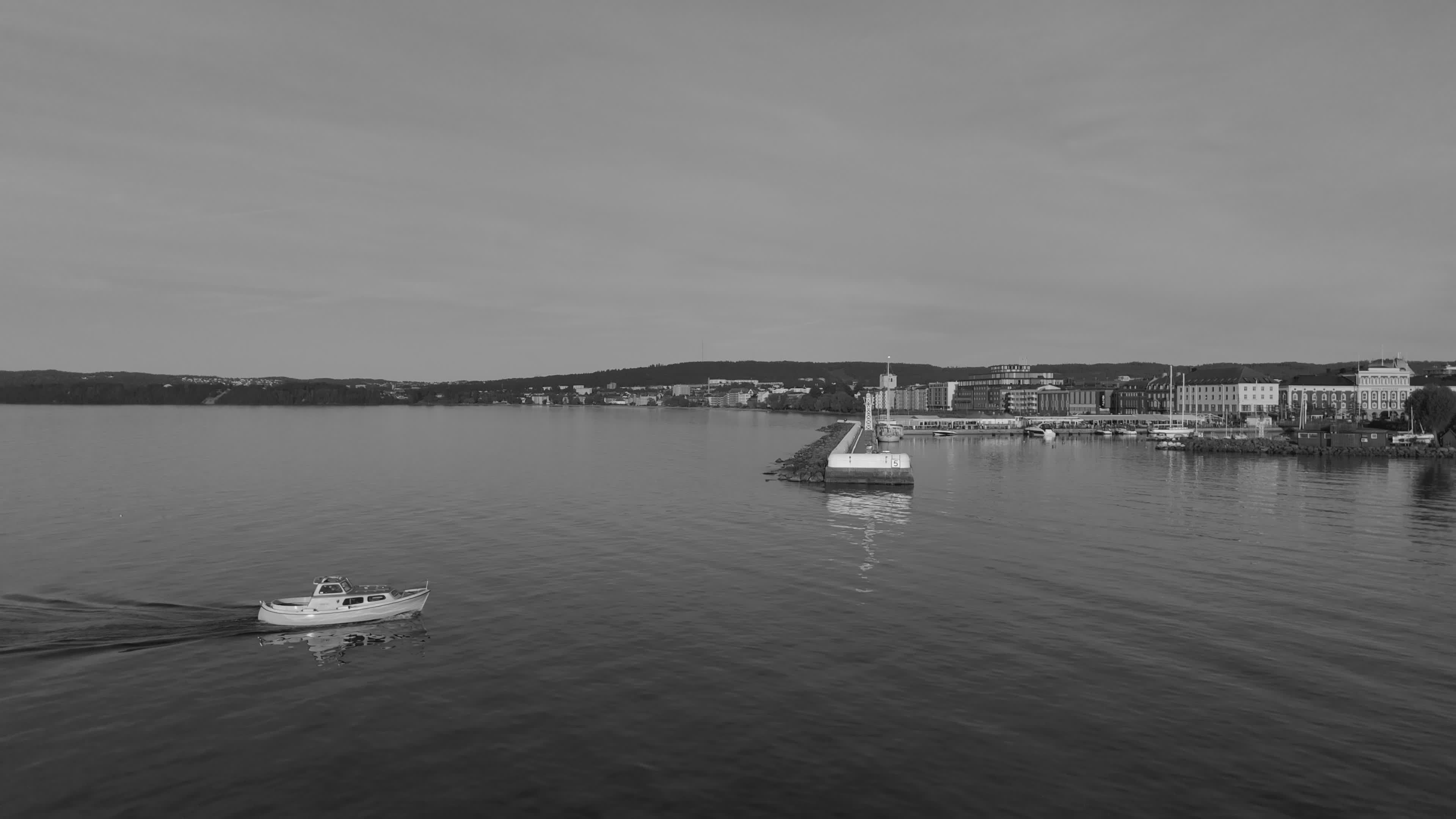 Serene Aerial View of Coastal City and Boat Free Stock Video Footage ...