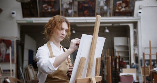 Woman Artist Doing A Portrait