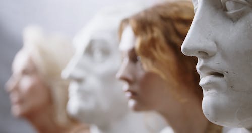 Line Of Women's Face And Bust Head Sculptures