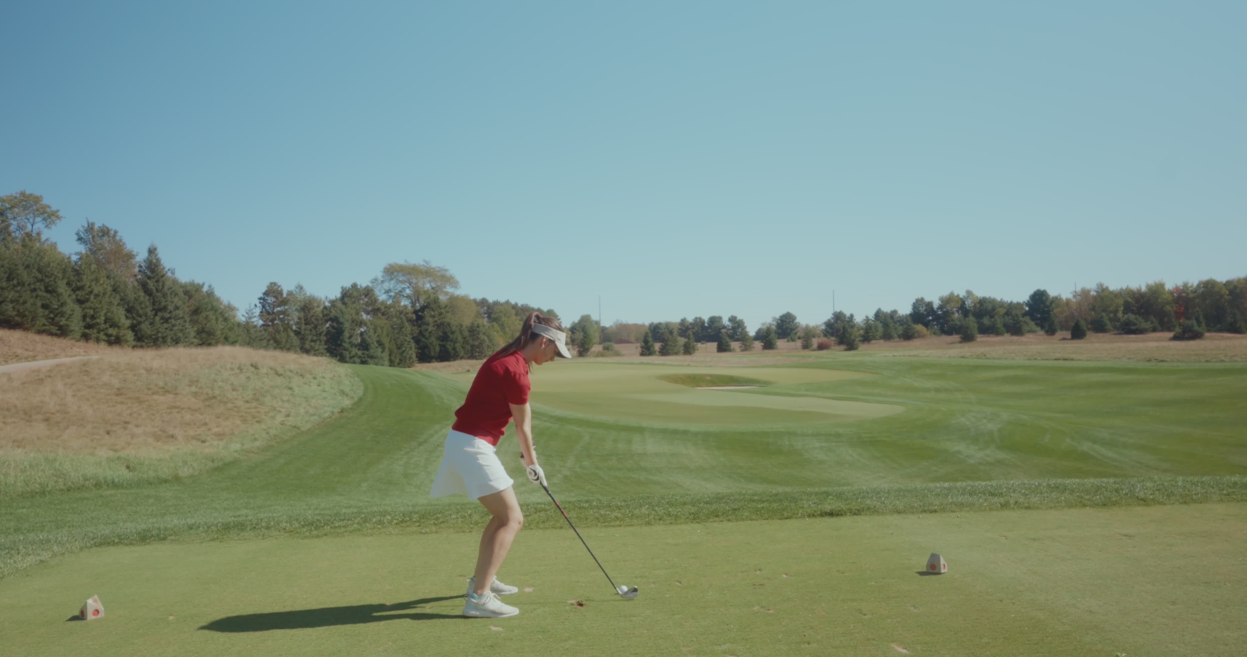 Female Golfer in Action on Sunny Golf Course Free Stock Video Footage ...