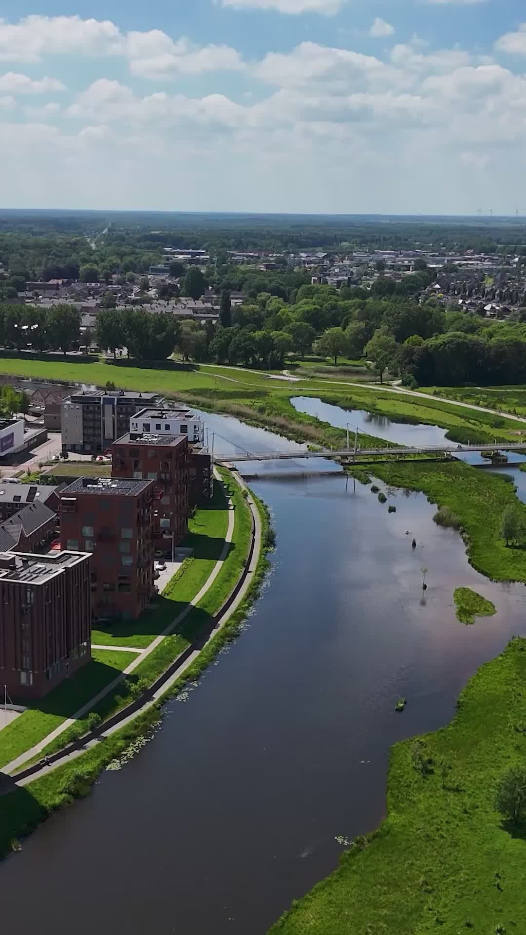Serene Aerial View of Urban Riverside Area Free Stock Video Footage ...
