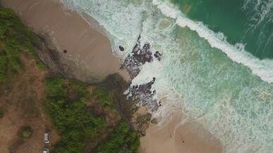 scenic aerial view of waves coastline beach