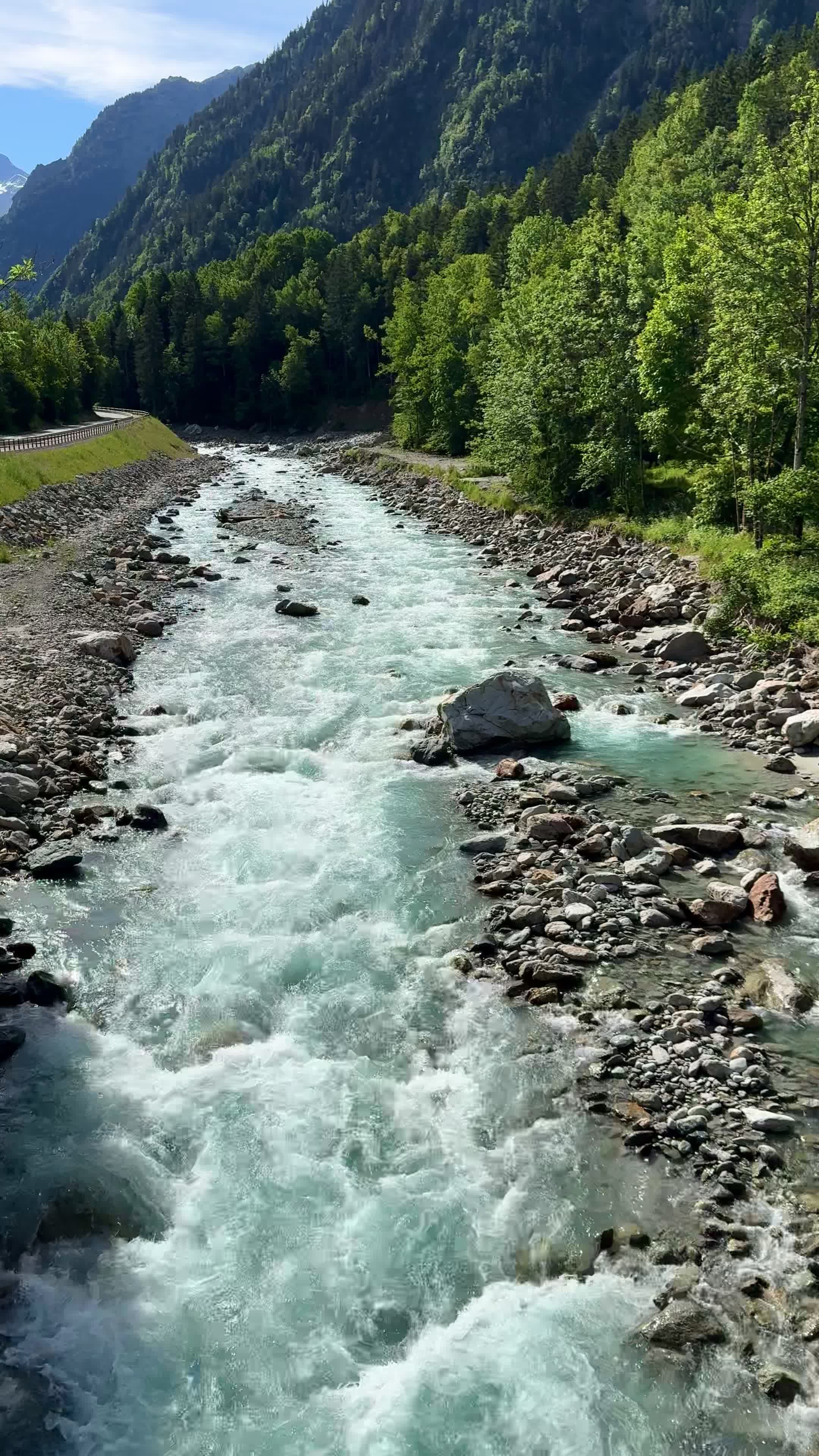 Scenic Flowing River in Mountainous Landscape Free Stock Video Footage