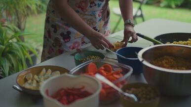 preparing traditional tamales outdoors