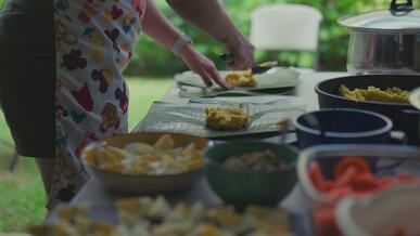 outdoor cooking preparation with fresh ingredients
