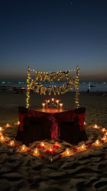 A Birthday Celebration Set-up On The Sand Of A Beach Shore Free Stock Video Footage, Royalty-Free 4K & HD Video Clip