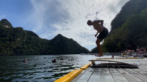 Man Jumps Into The Water