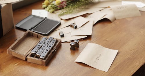 Printing The Word " I LOVE YOU' On A Paper Using Letter Rubber Stamps With Ink