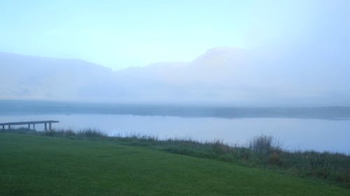 Fogs Covering The Lake In Early Morning