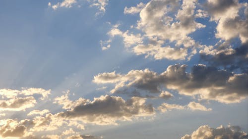 Clouds Formation Scattering The Sun Rays In The Sky