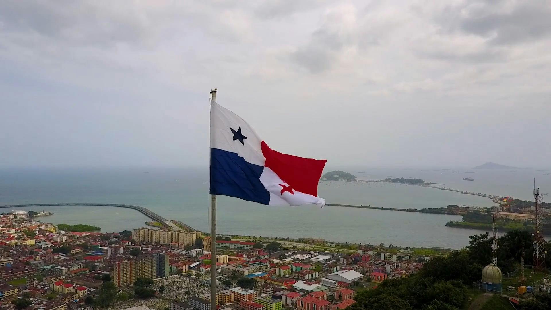 Footage Of Panama Flag And The City In High Angle · Free Stock Video