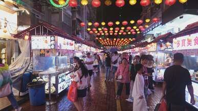 bustling asian night market with lanterns