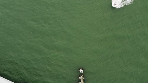 A Boat Traveling In Drone View