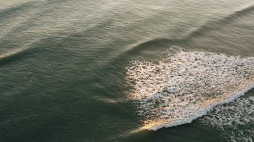 Sunset Reflection Over The Sea Surface