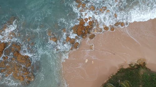 Footage Of The Waves Hitting The Rocks