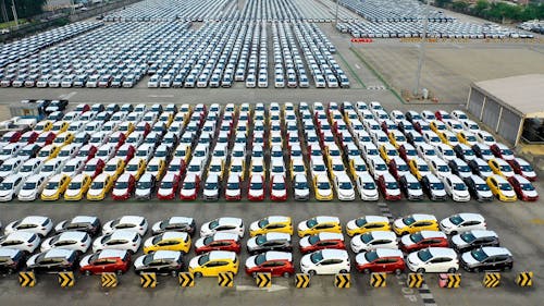 Drone Footage Of Motor Vehicles Parked On A Storage Lot