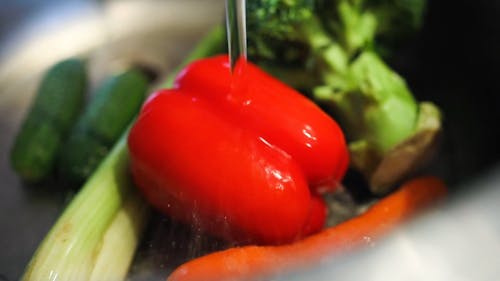 Washing Fresh Vegetables In Running Water