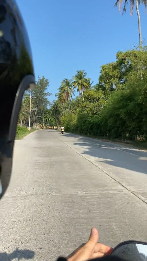 A Man Riding A Motorcycle