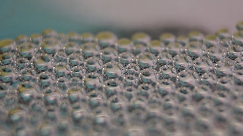 Clear Tiny Bubbles In A Close-up Video