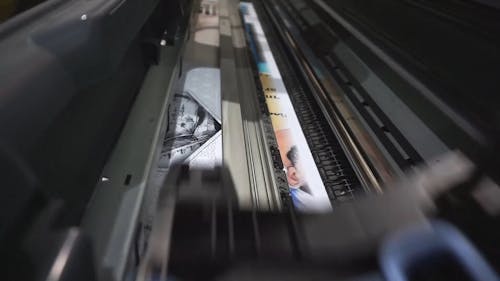 A Modern Digital Printing Machine In Operation
